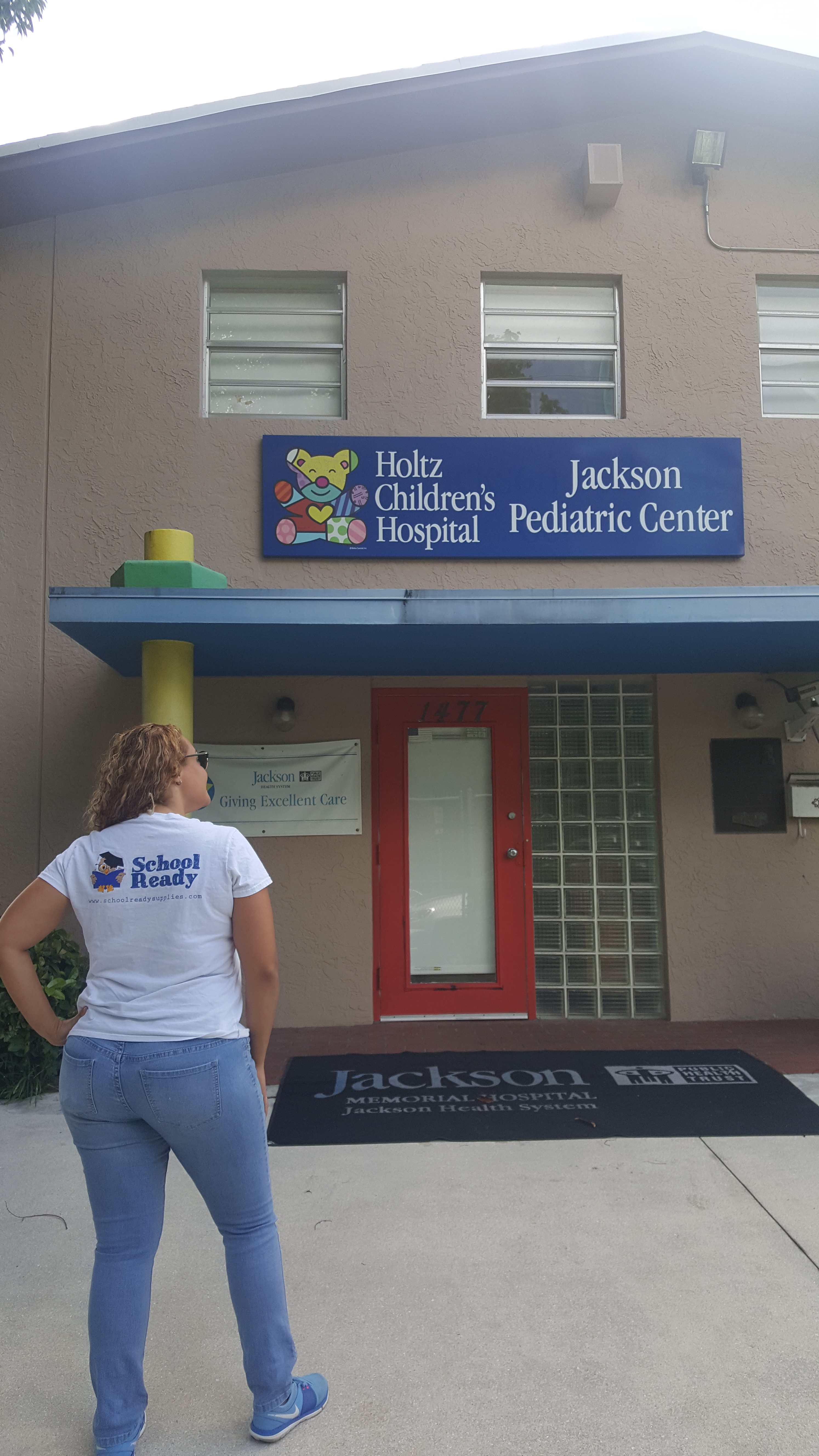 woman outside children's hospital