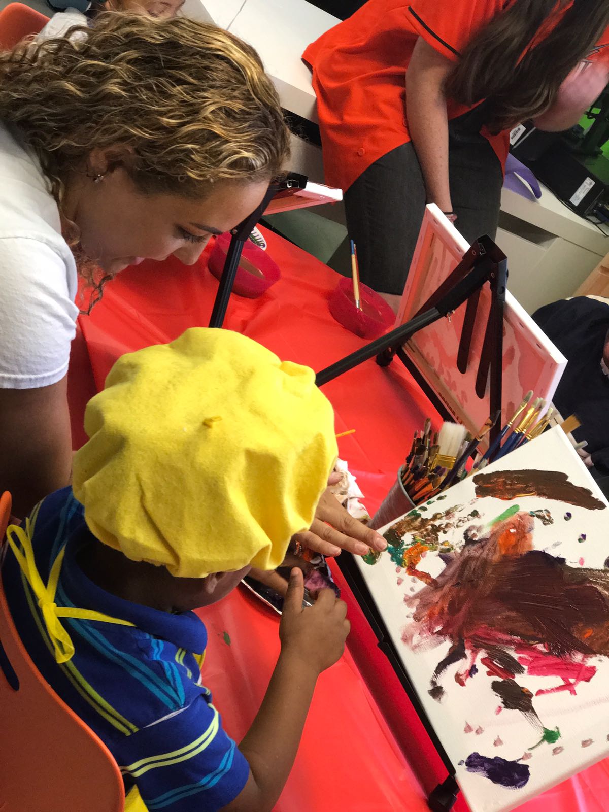 woman and child finger painting