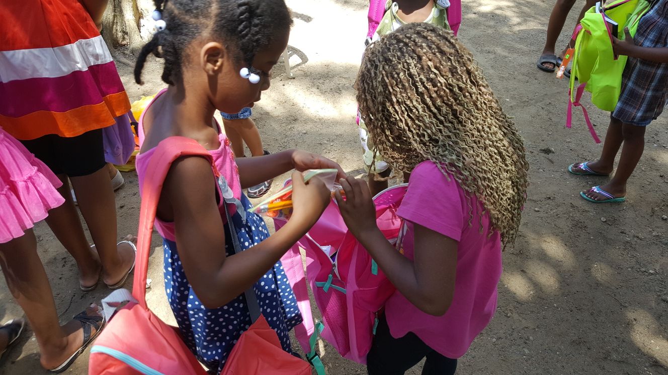 Two children with backpack