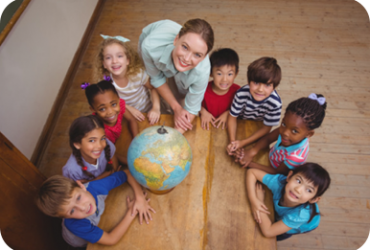 children smiling group of kids with globe